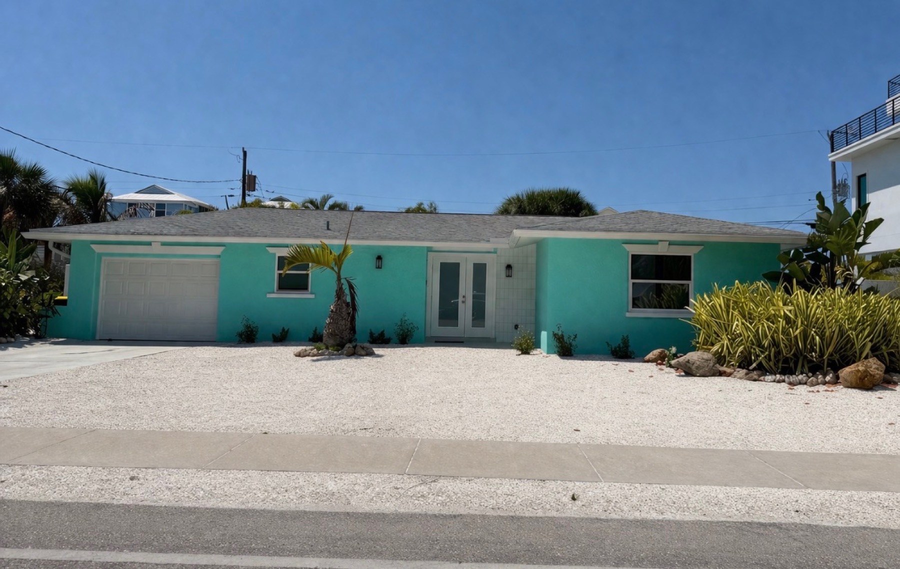 Tropical Oasis, Englewood Beach — turquoise cottage exterior